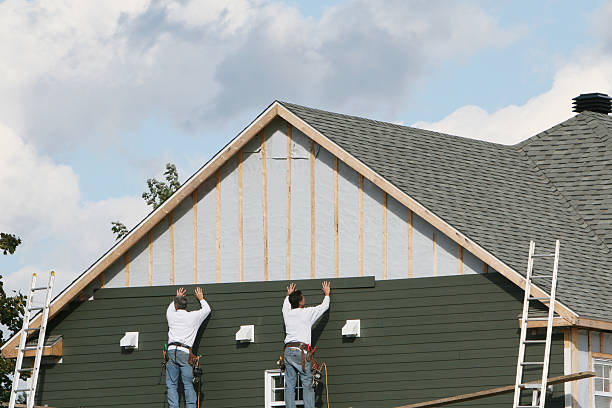 Professional Storm Damage Siding Repair technician working in Rochester, NY